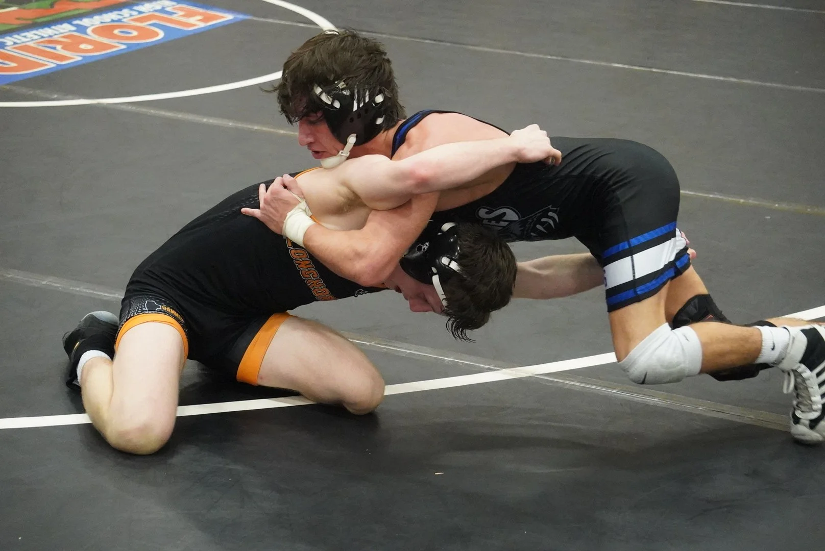 Wellington builds big lead and holds on to win region duals title