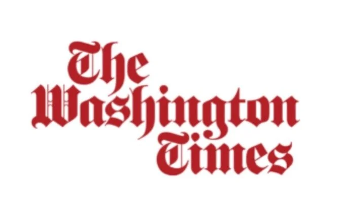 Logo of The Washington Times in red gothic font.