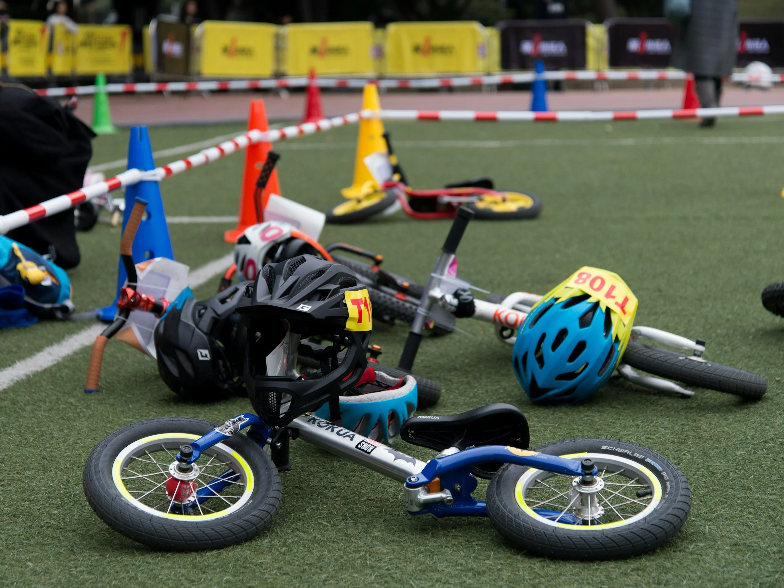 parked kids bikes at a competition