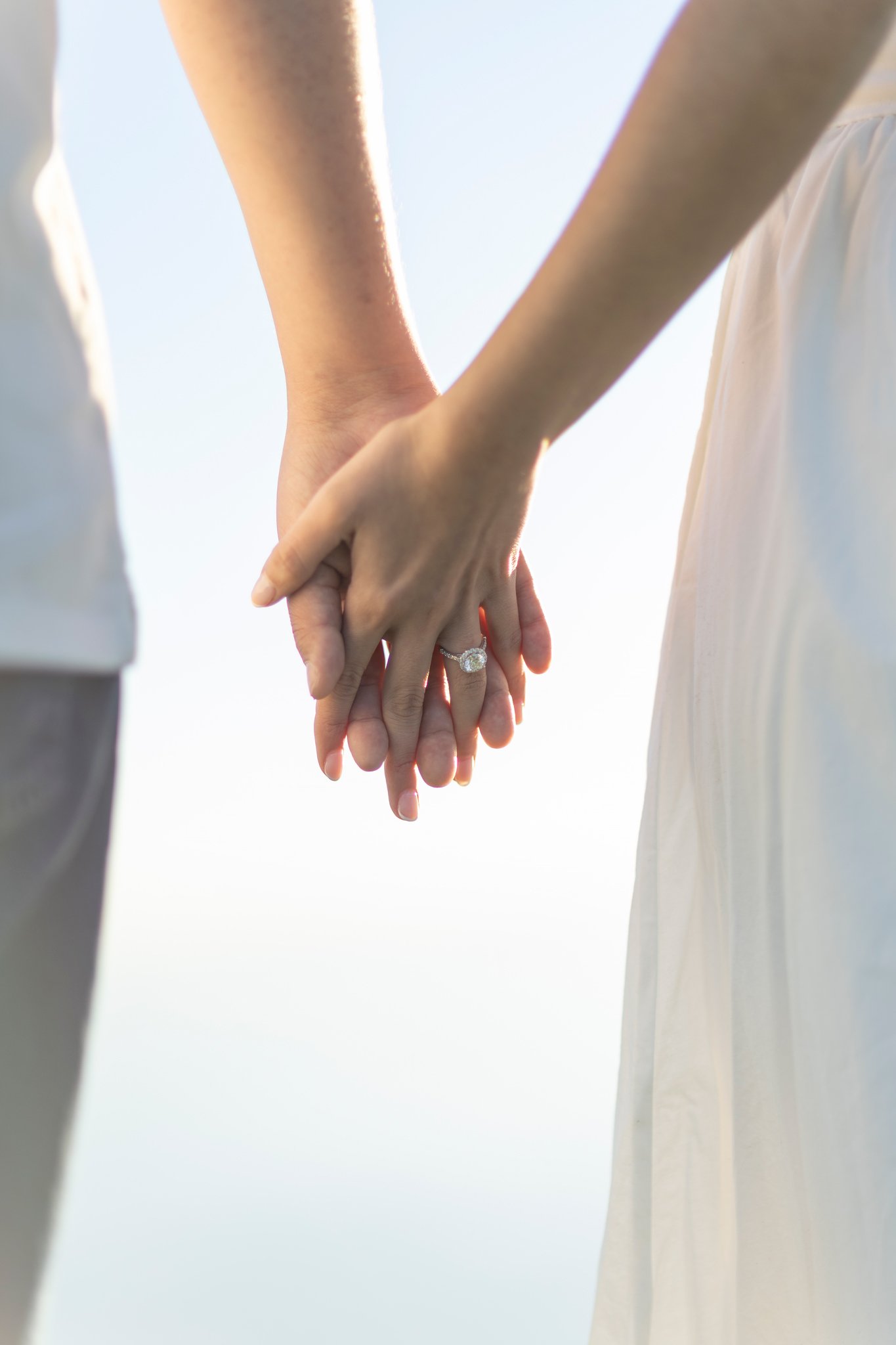 Engagement Ring Detail Couple photo