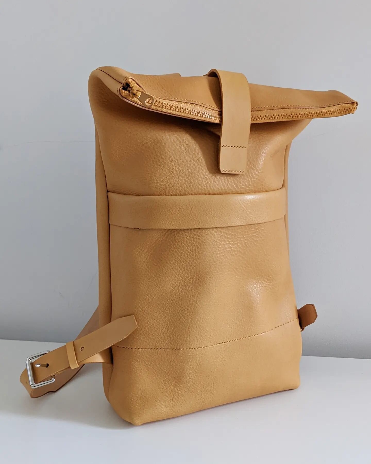 Another big achievement. I've wanted to make a backpack for so long and finally had a customer approach me to create one in this beautiful mustard colour. 
I chose to go for matching zips and hand dye the straps to highlight the lovely leather and mi