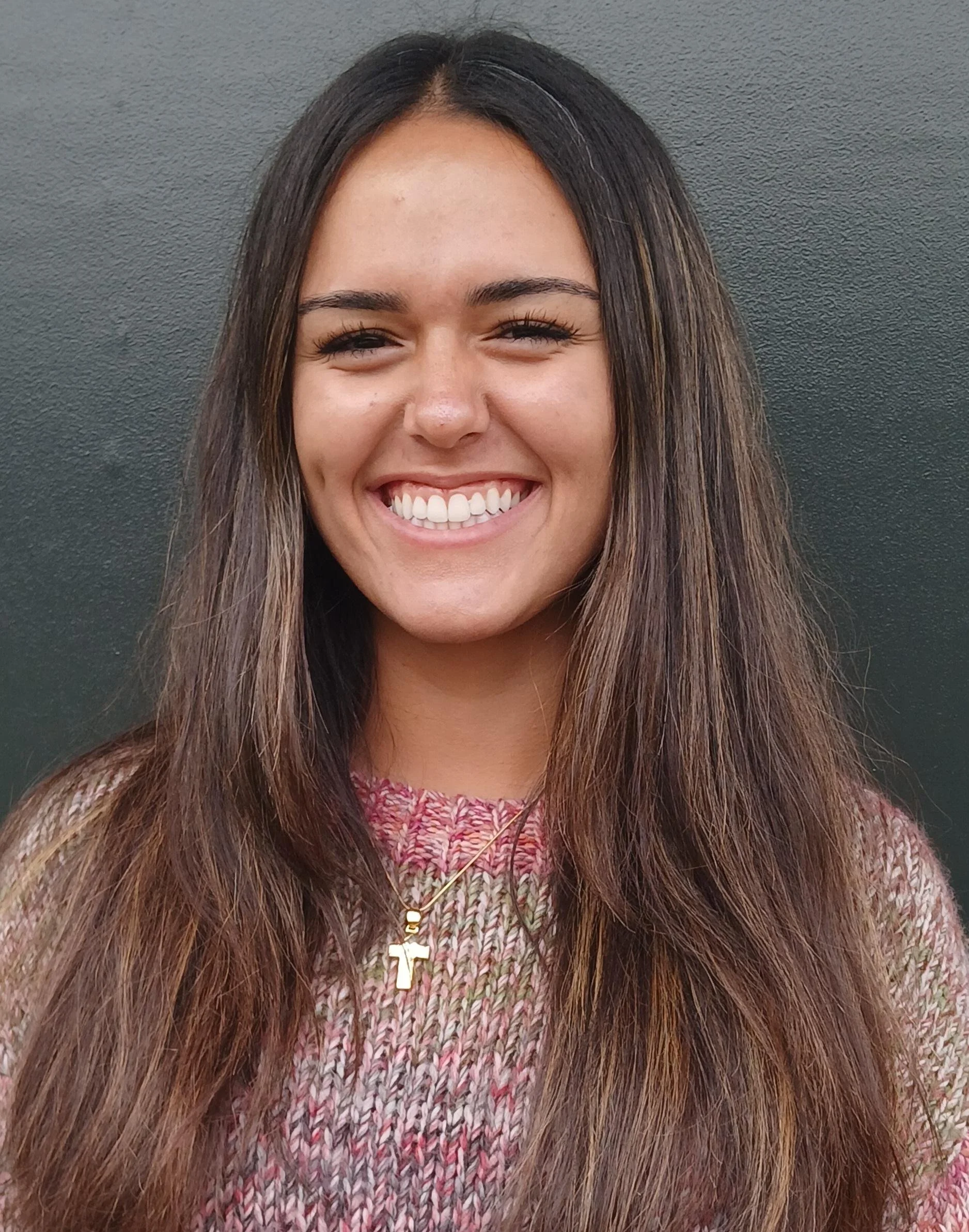 Laura Stoker of Falls Church High School has earned a 2025 Michell Merhige Scholarship. Laura faced the challenges of family loss, abuse, mental health needs and the untimely death of her mother, whom she described as "in everything that makes me, me
