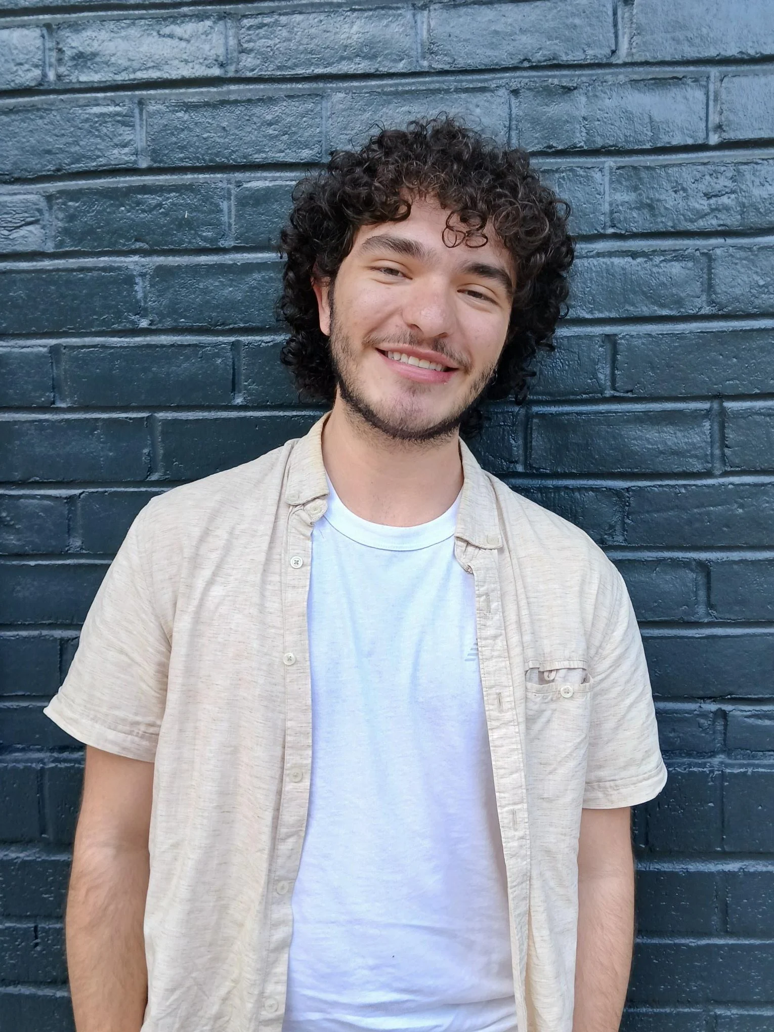 Santiago Gomez Diaz is a 2024 Michell Merhige Scholar who graduated from Falls Church High School. Despite his mother's departure when he was four, navigating a serious illness, and coming to Falls Church from Colombia with limited English, Santi was