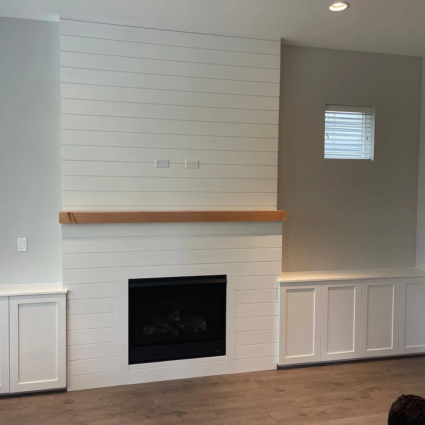 Another clean install, removed a tile surround and brought out the fireplace 6&rdquo; to make flush with the custom cabinets left and right