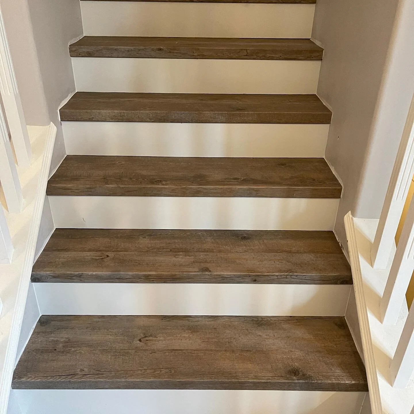 Luxury vinyl plank square nosings with white risers @movaitriple colour Carlsbad... walls need a little paint job to cover where the old carpet was but turned out awesome