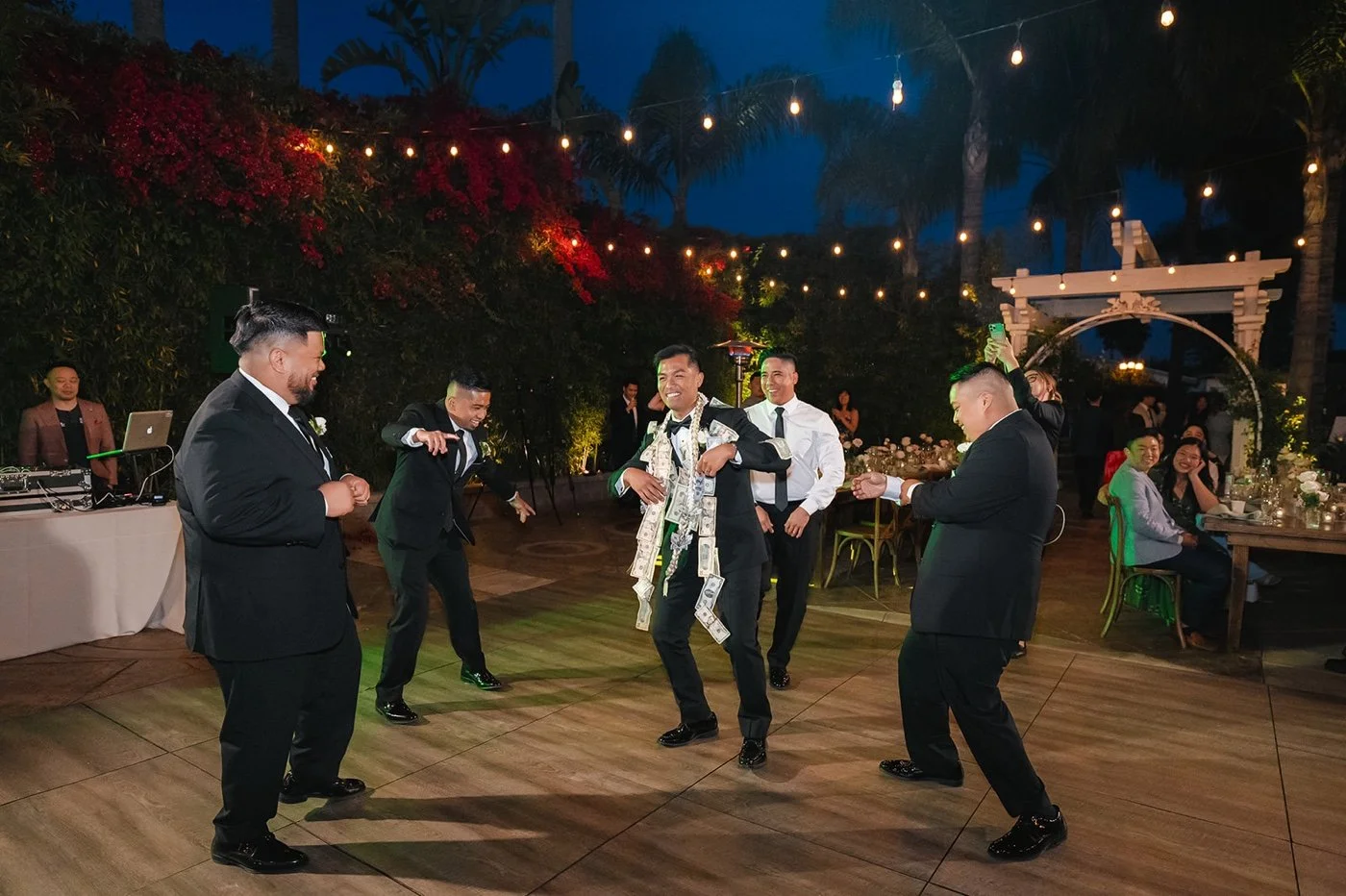 money dance at a rancho de las palmas wedding reception