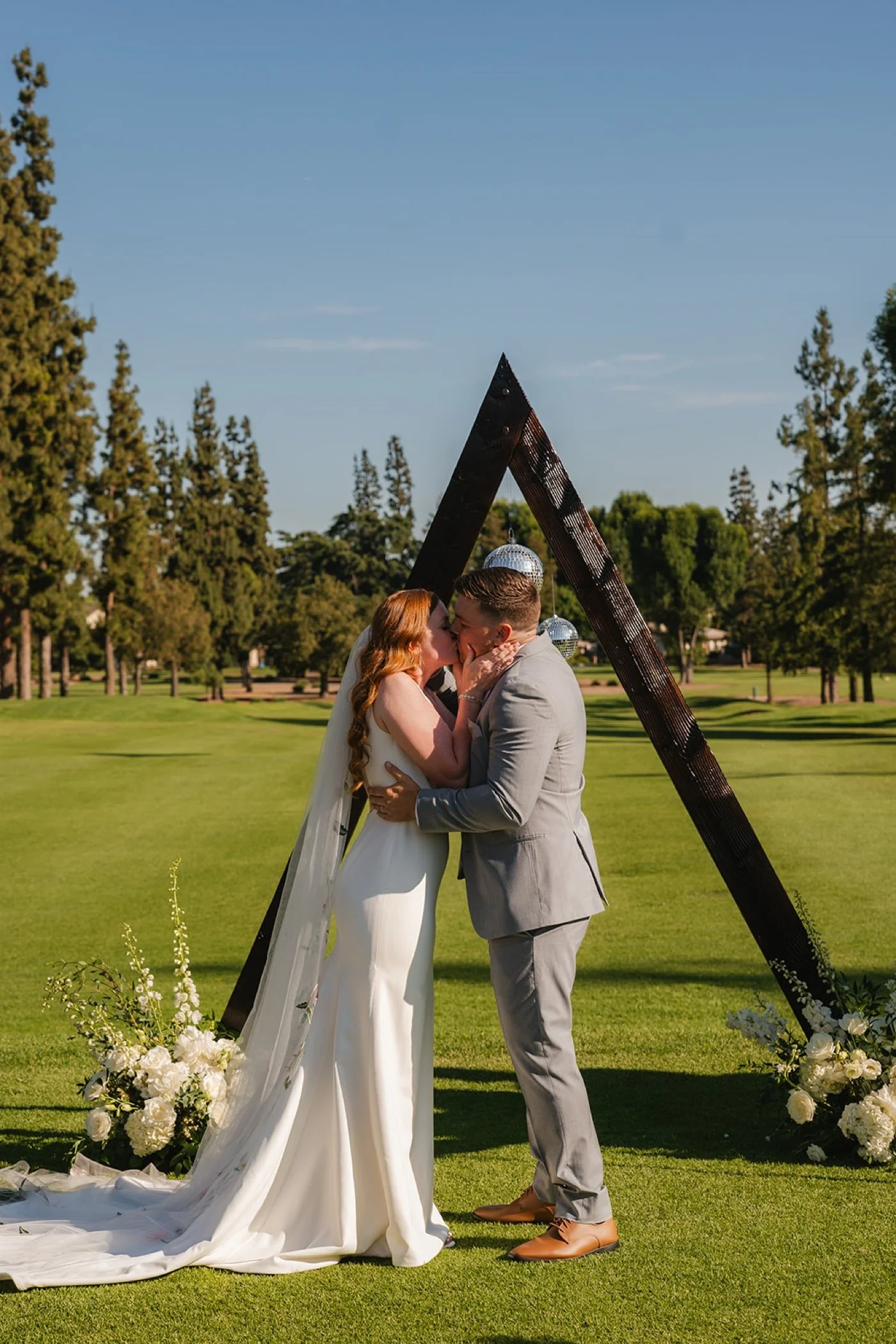 wedding ceremony on the golf course at glendora country club