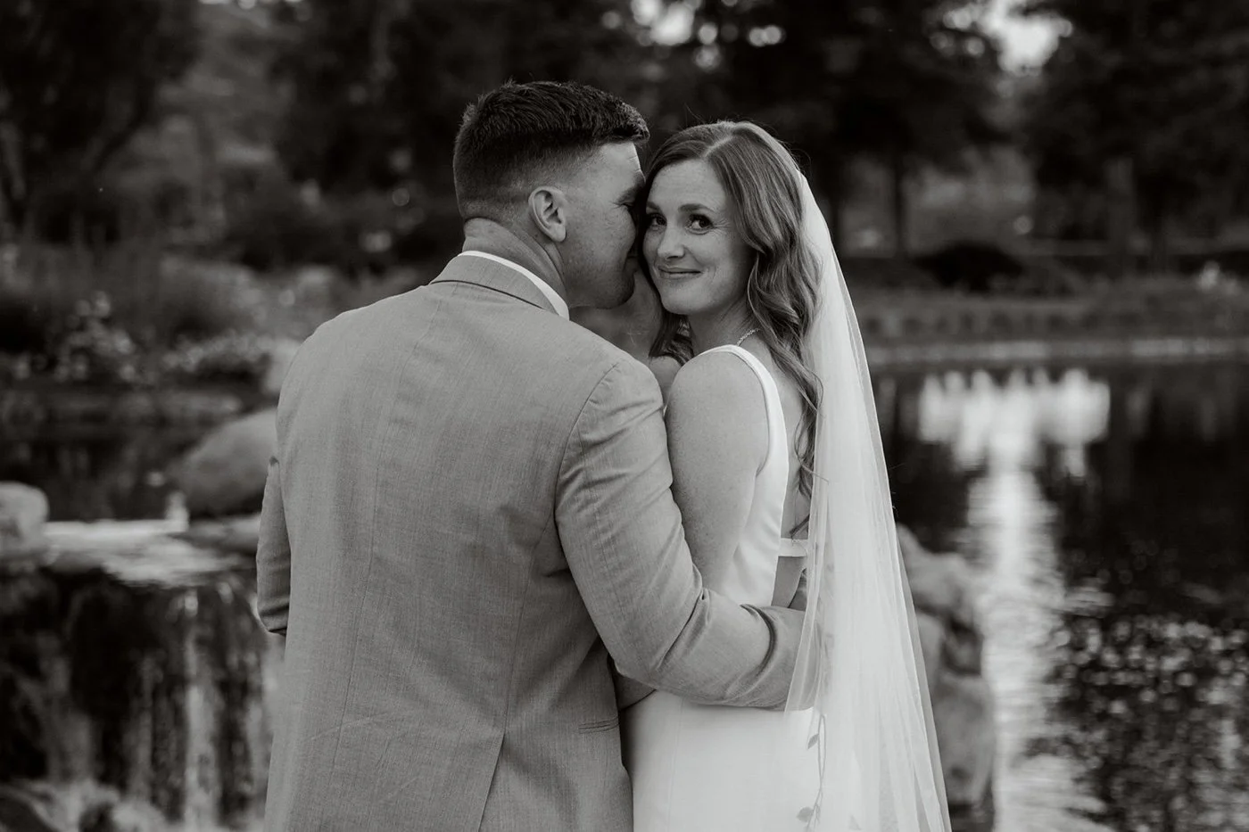 bride and groom taking portraits at their glendora country club wedding