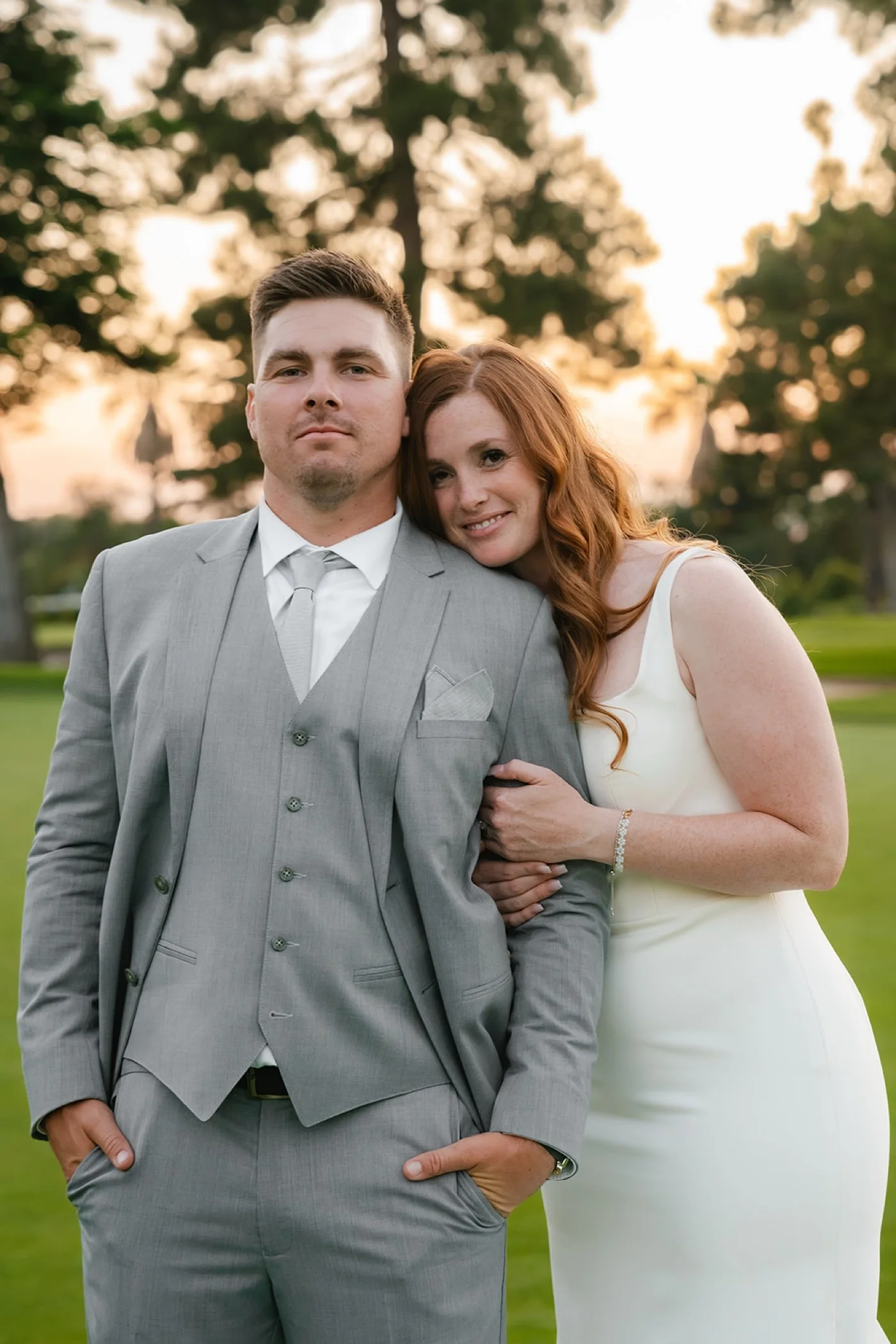 bride and groom taking portraits at their glendora country club wedding