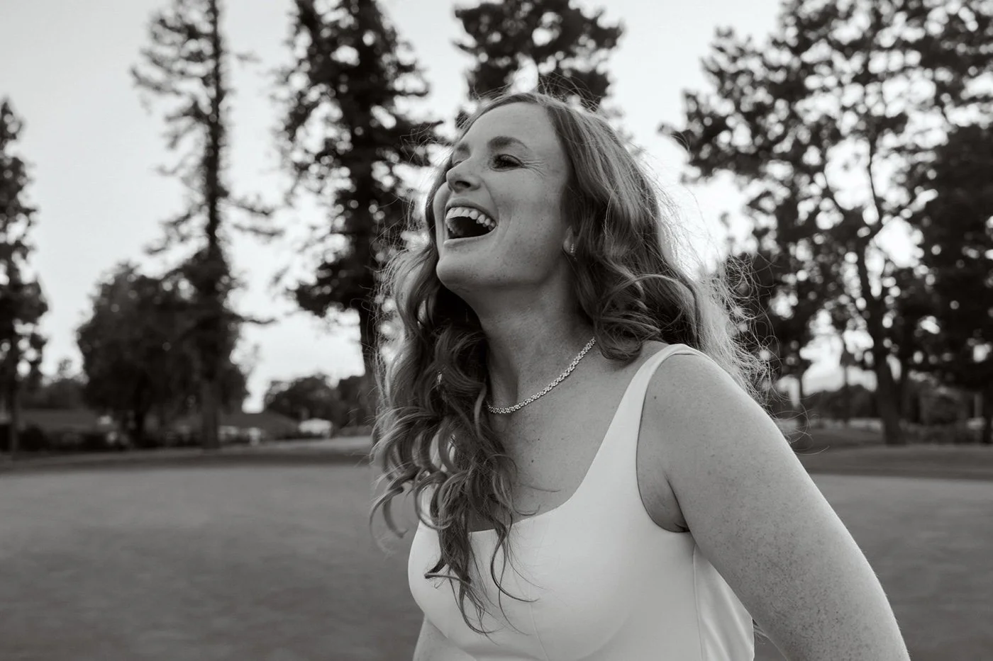 bride and groom taking portraits at their glendora country club wedding