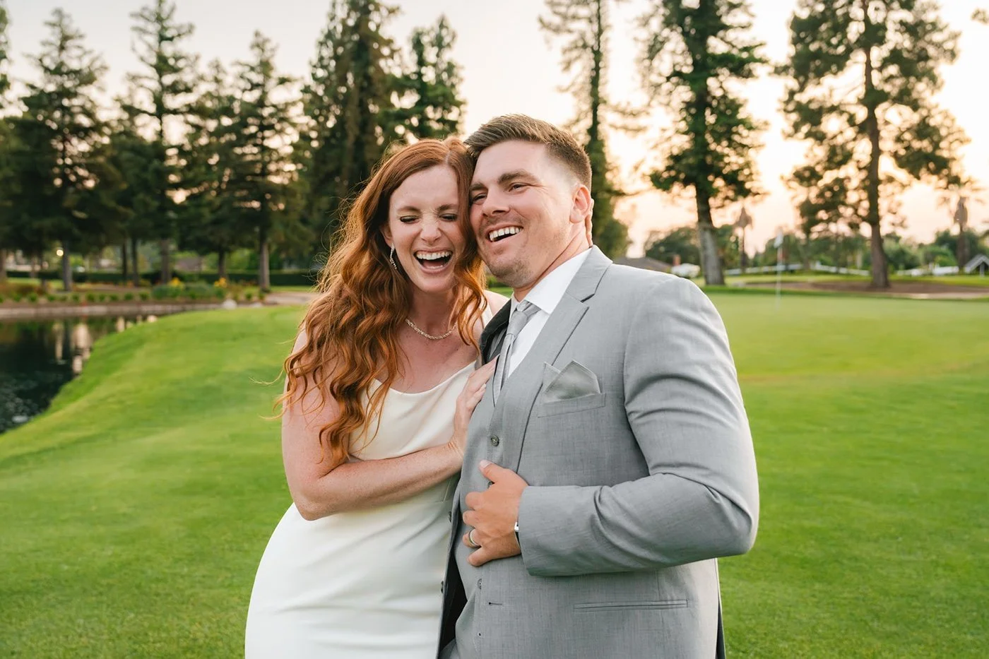 bride and groom taking portraits at their glendora country club wedding