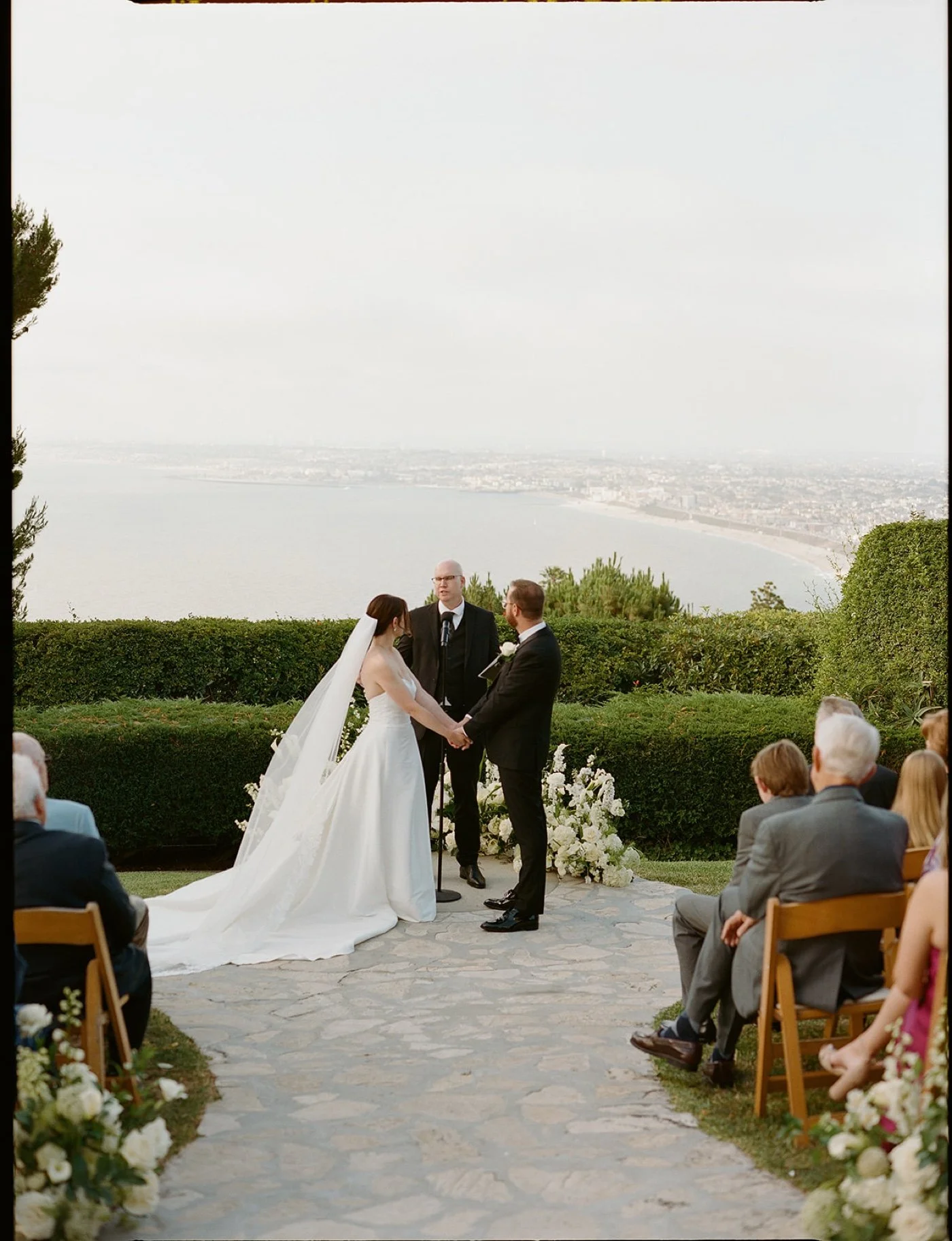 a contax 645 film photo of a wedding ceremony at la venta inn in palos verdes estates california