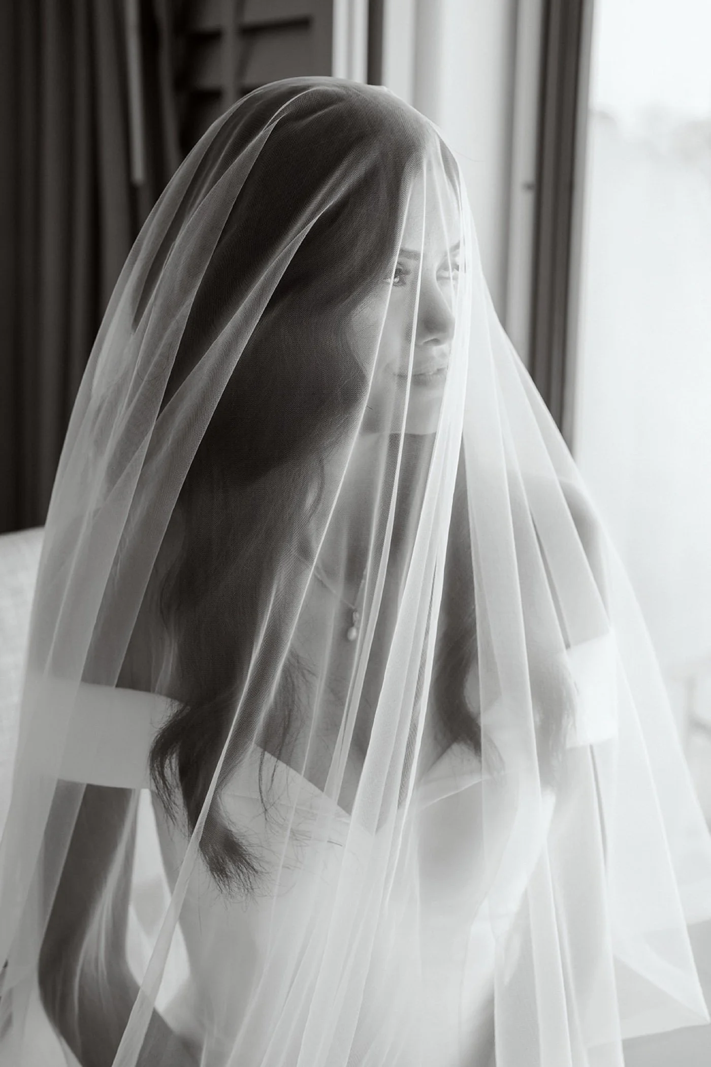 a bride getting ready for her wedding at cabrillo pavilion in santa barbara