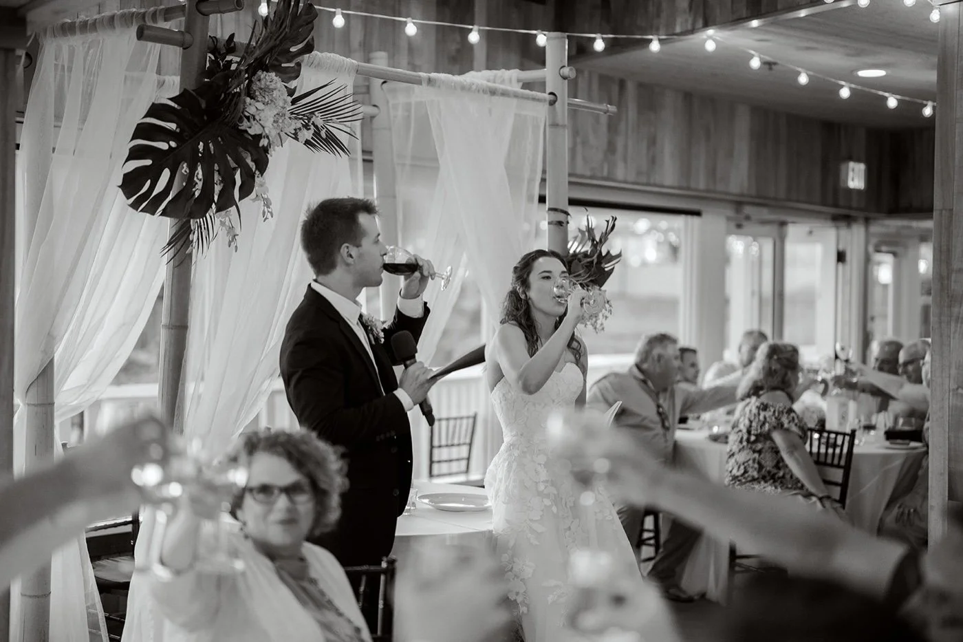 wedding reception with tropical details at duke's malibu in california