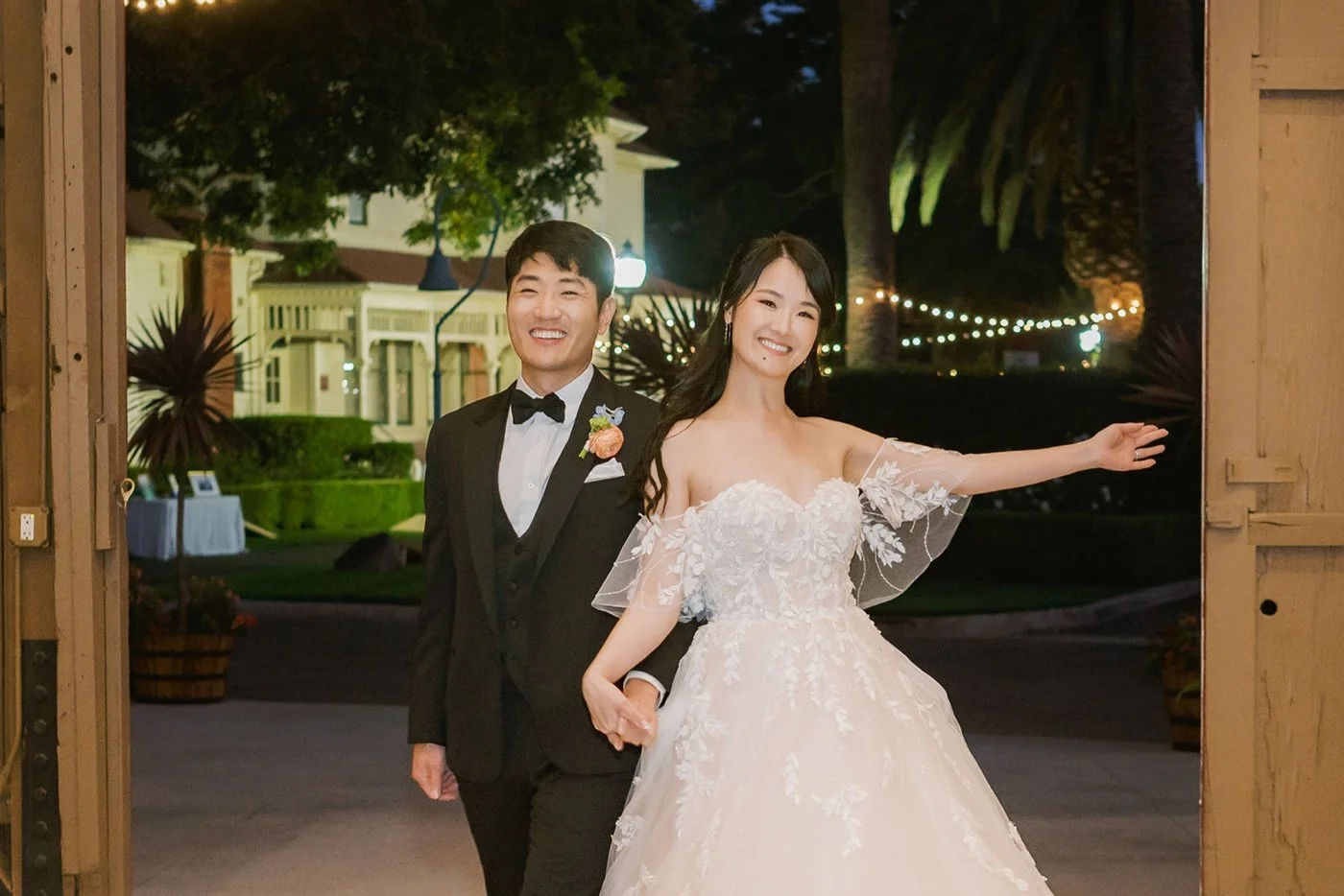 bride and groom entering their barn wedding at camarillo ranch