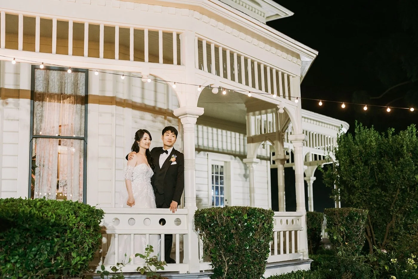 bride and groom taking portraits at night at their camarillo ranch wedding