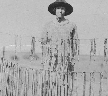 Rattlesnake Kate with her snakes hanging