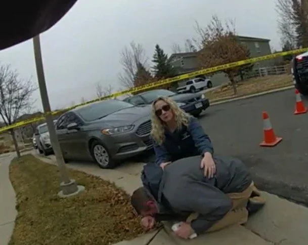 Daniel Krug being comforted by the victim advocate