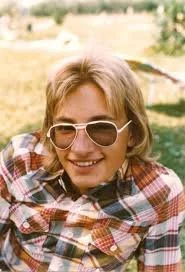 Christian in his teens prior to moving to the US