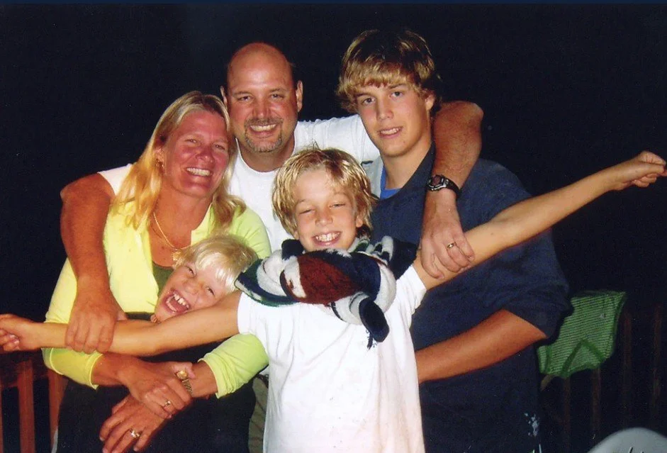 Tamara, left, and John Browning, center, are shown with their children Nicholas, top right, Benjamin, left, and Gregory, right.