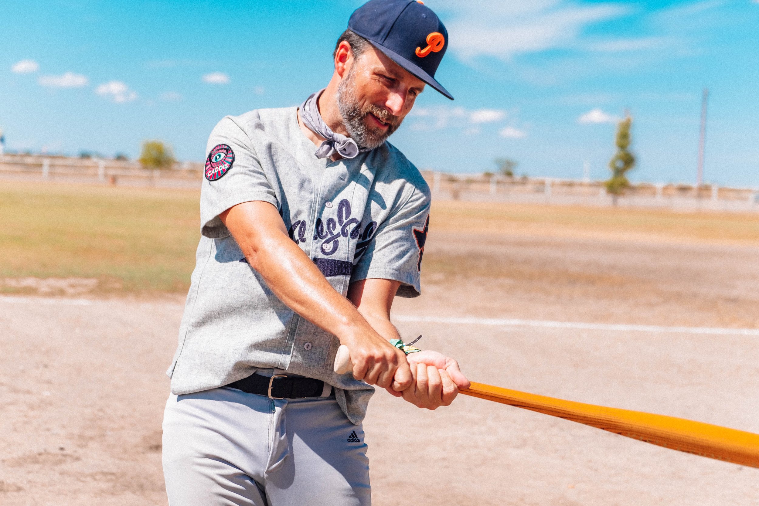 Texas Playboys baseball club checking out the Warstic bat branded by Madre Mezcal
