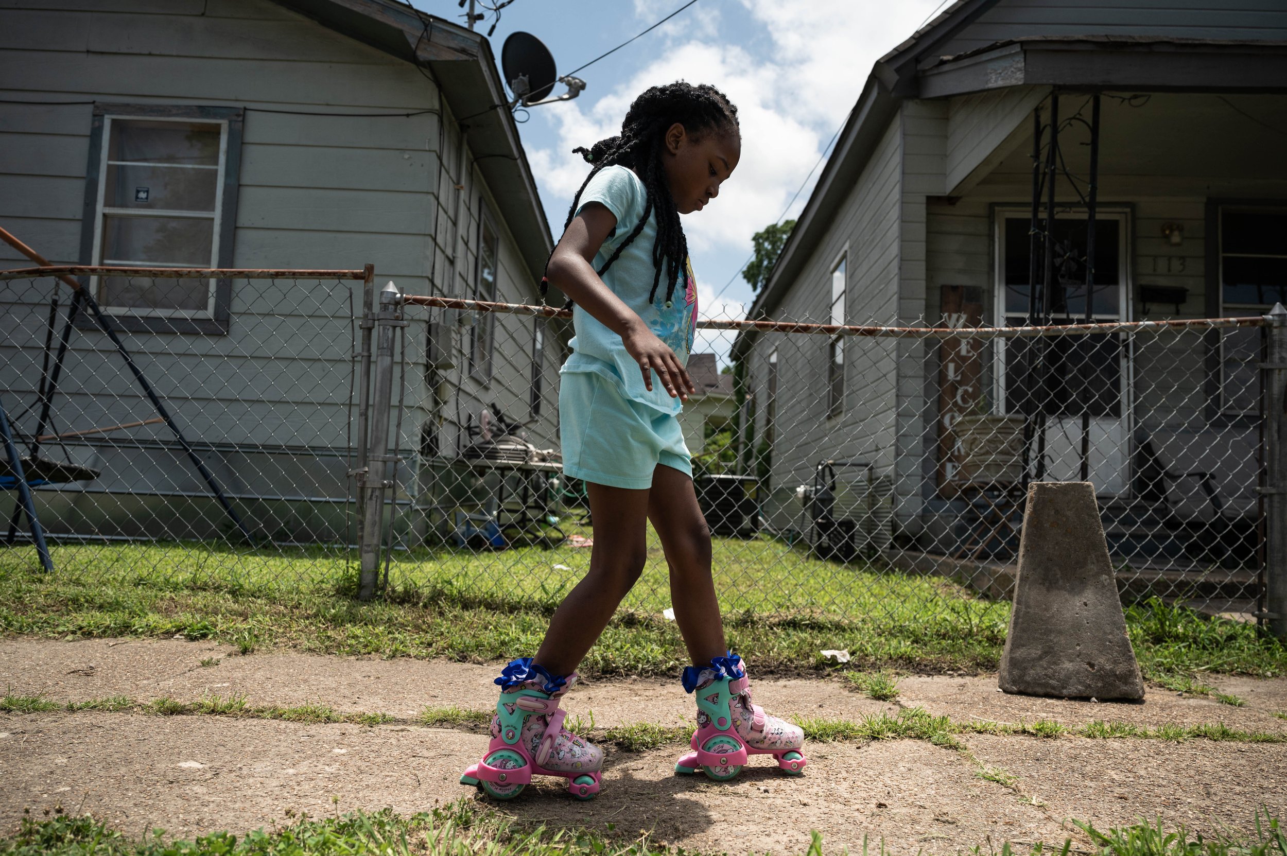 Young Black girl Cheyenne McCorkle roller skating in Greenwood Mississippi — documentary portrait produced for SPARK autism research by Black Shutter Productions