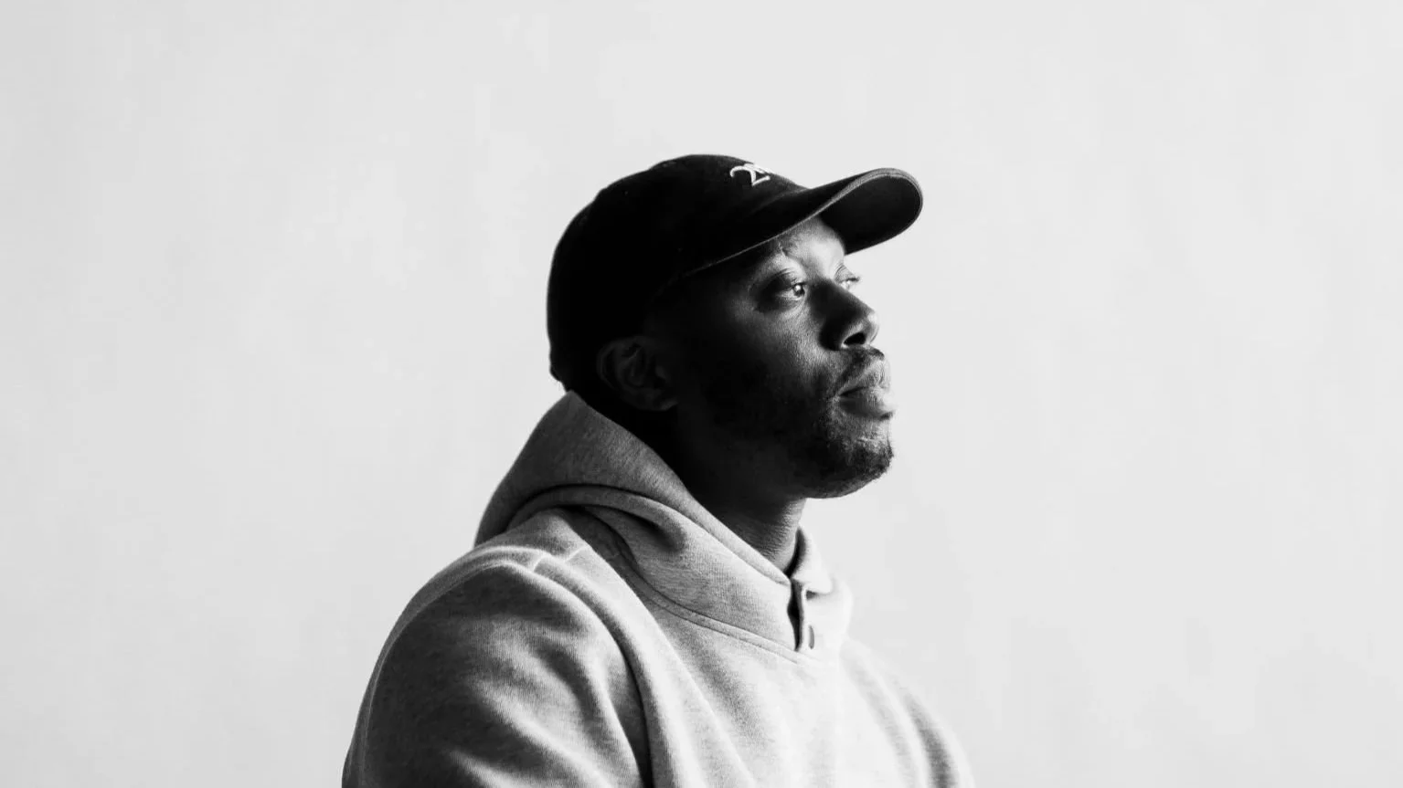 Black and white portrait of Idris Solomon, founder of Black Shutter Productions, New York City