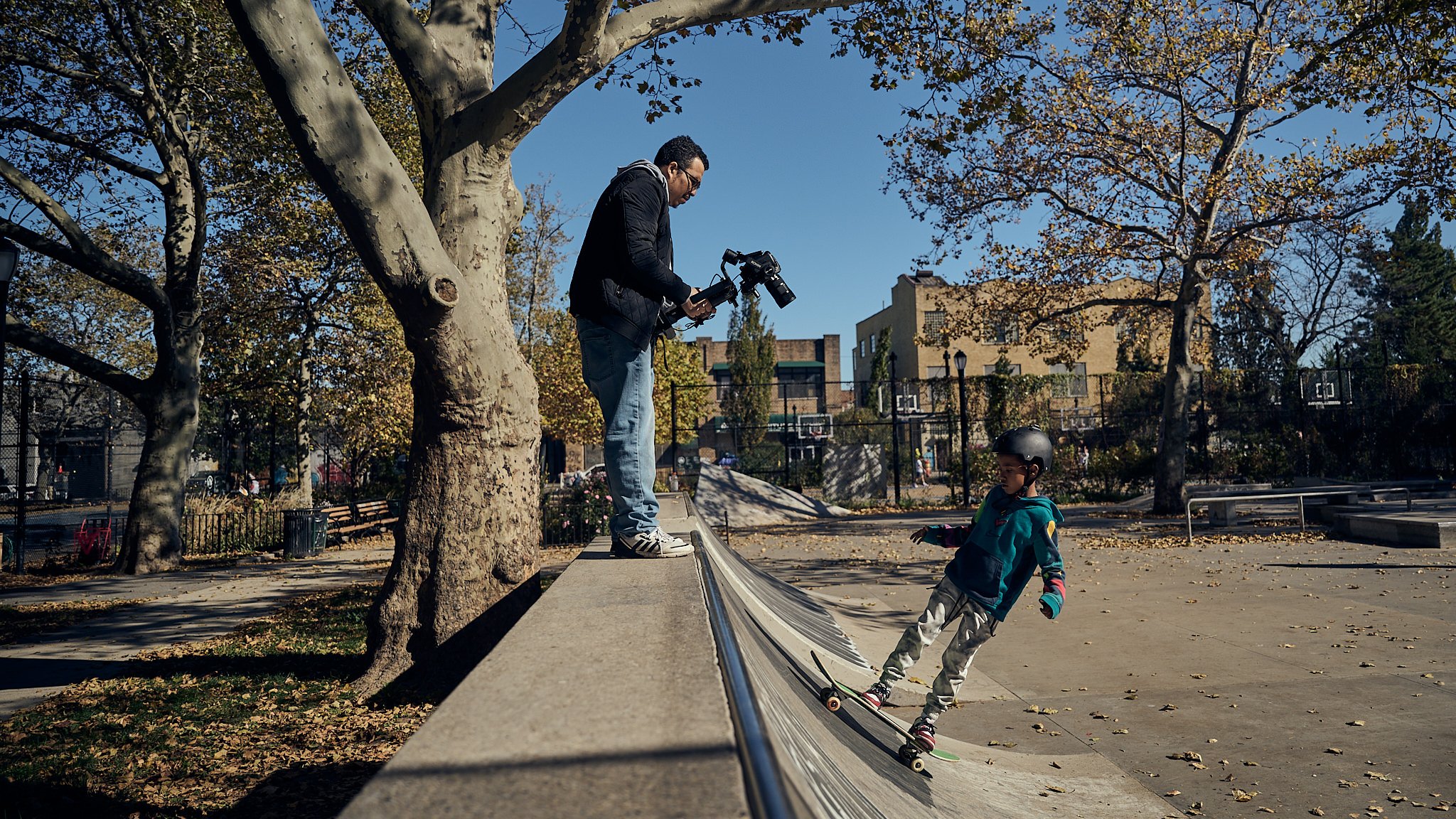 Director of photography Steven Tapia filming young Black skateboarder Talib on set in Brooklyn New York — behind the scenes production still from Pebbles Suck by Black Shutter Productions