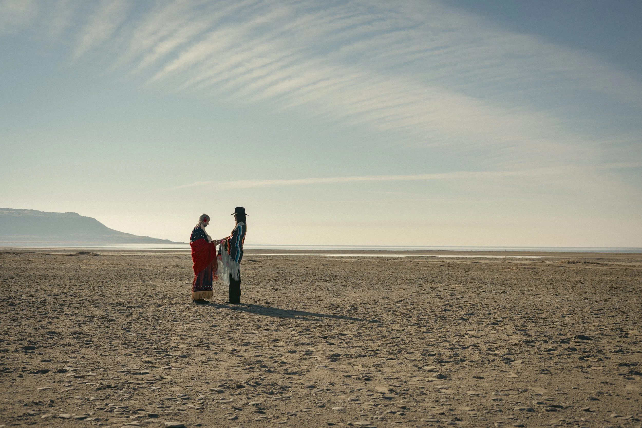 Regina Dezbah Simons with Native Elder standing on Antelope Island in Utah.