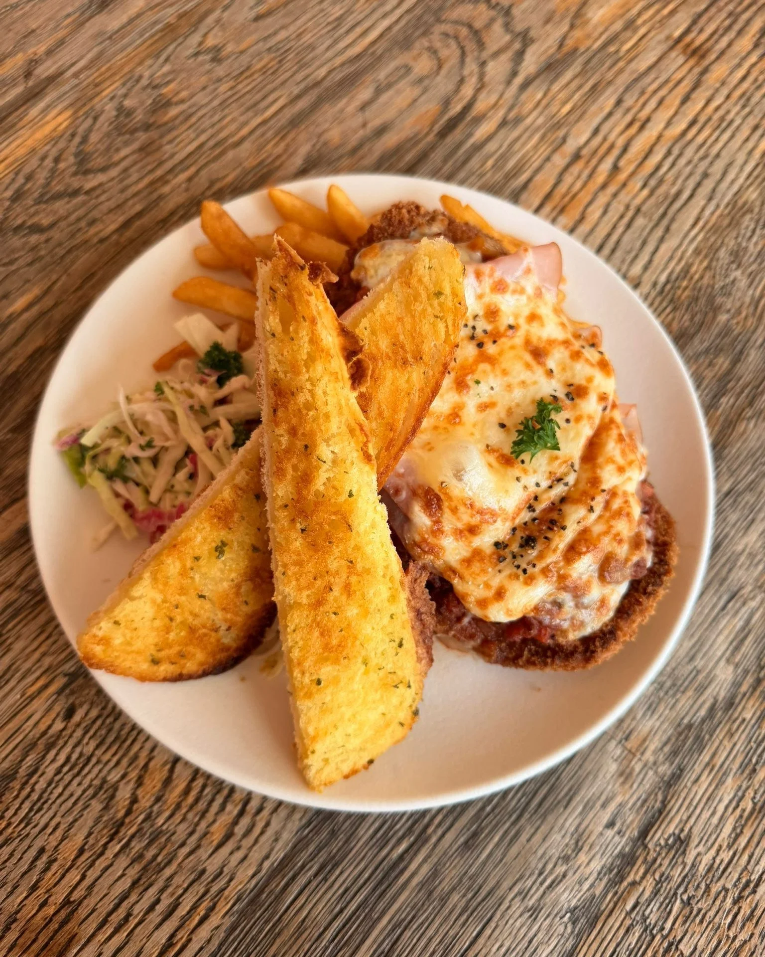 Swing by @therockleypub and settle in for a proper pub feed with this weekend's special, a comforting classic with a twist - Bolognese chicken Parmi!

Add garlic bread + $3 and enjoy it while it lasts.

#therockleypub #bathurstnsw #centralwestnsw #ch