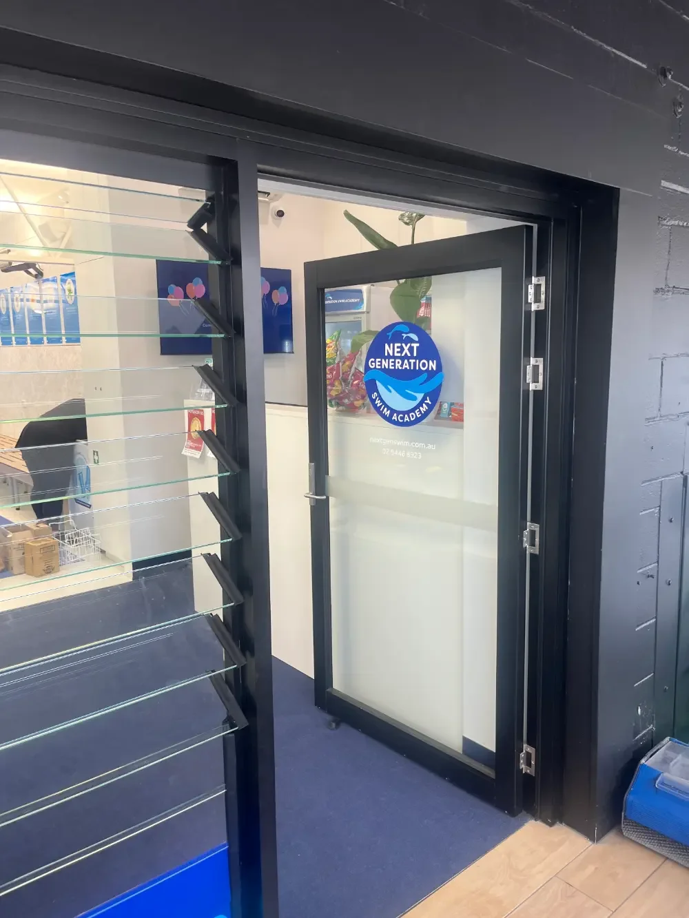 Swim centre shop front signage Northern Beaches