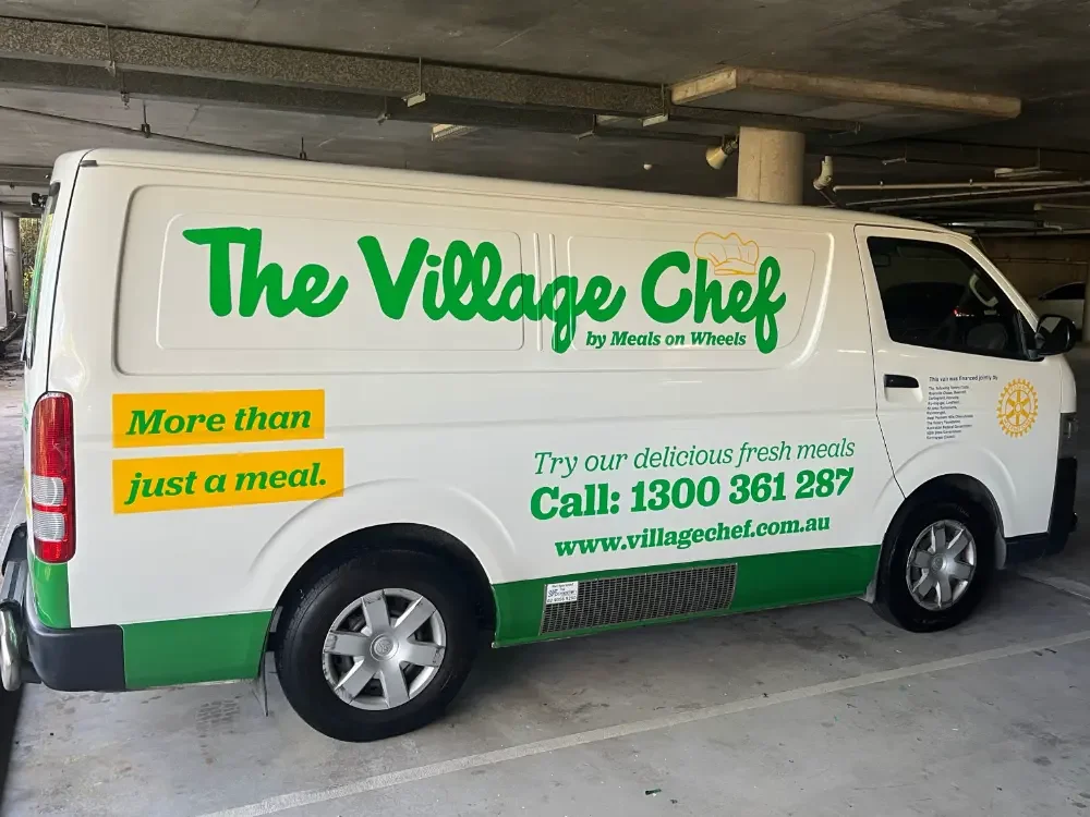 The Village Chef car signage