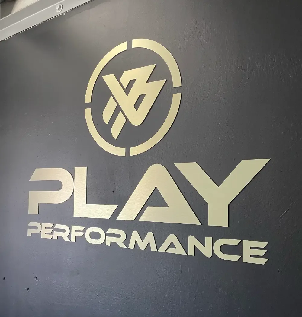 Play Performance acrylic signage