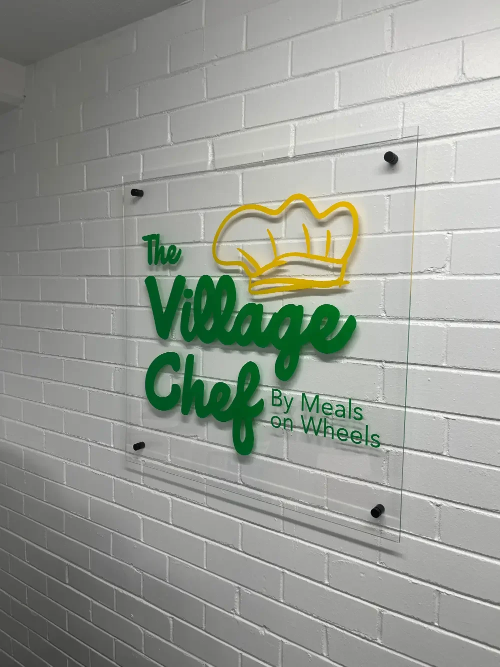 The Village Chef signage