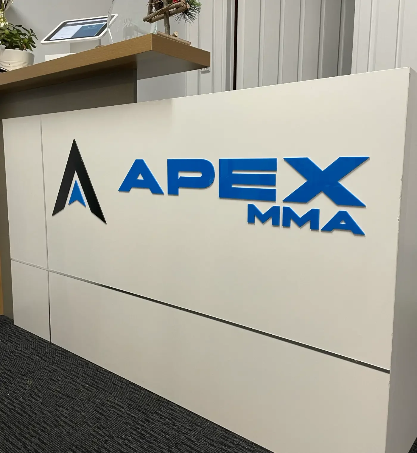 APEX MMA reception area signage