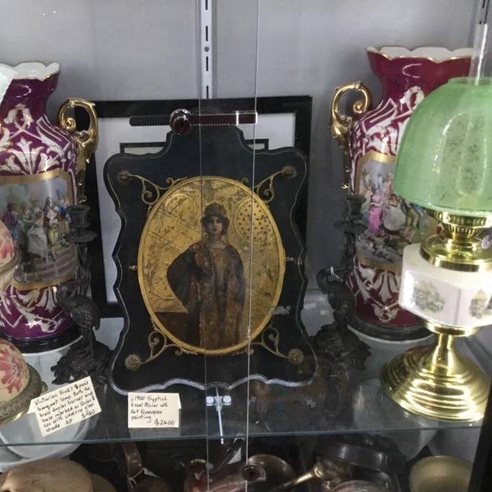 A Triptich Mirror with a Klimt styled woman on tits front