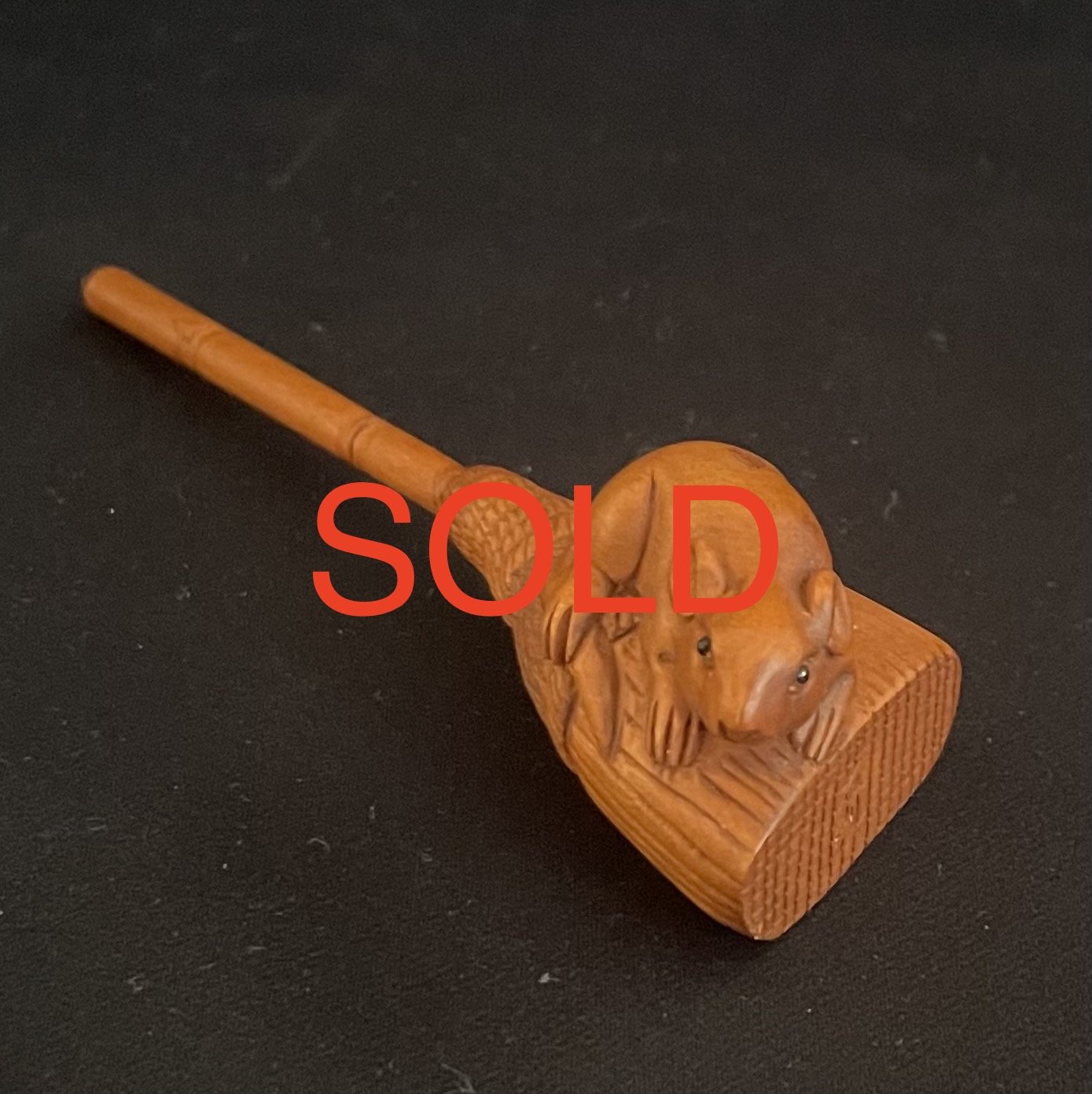 Netsuke, Carved from Wood,Signed: a Mouse with Glass Eyes Sitting on a Broomstick.
SOLD