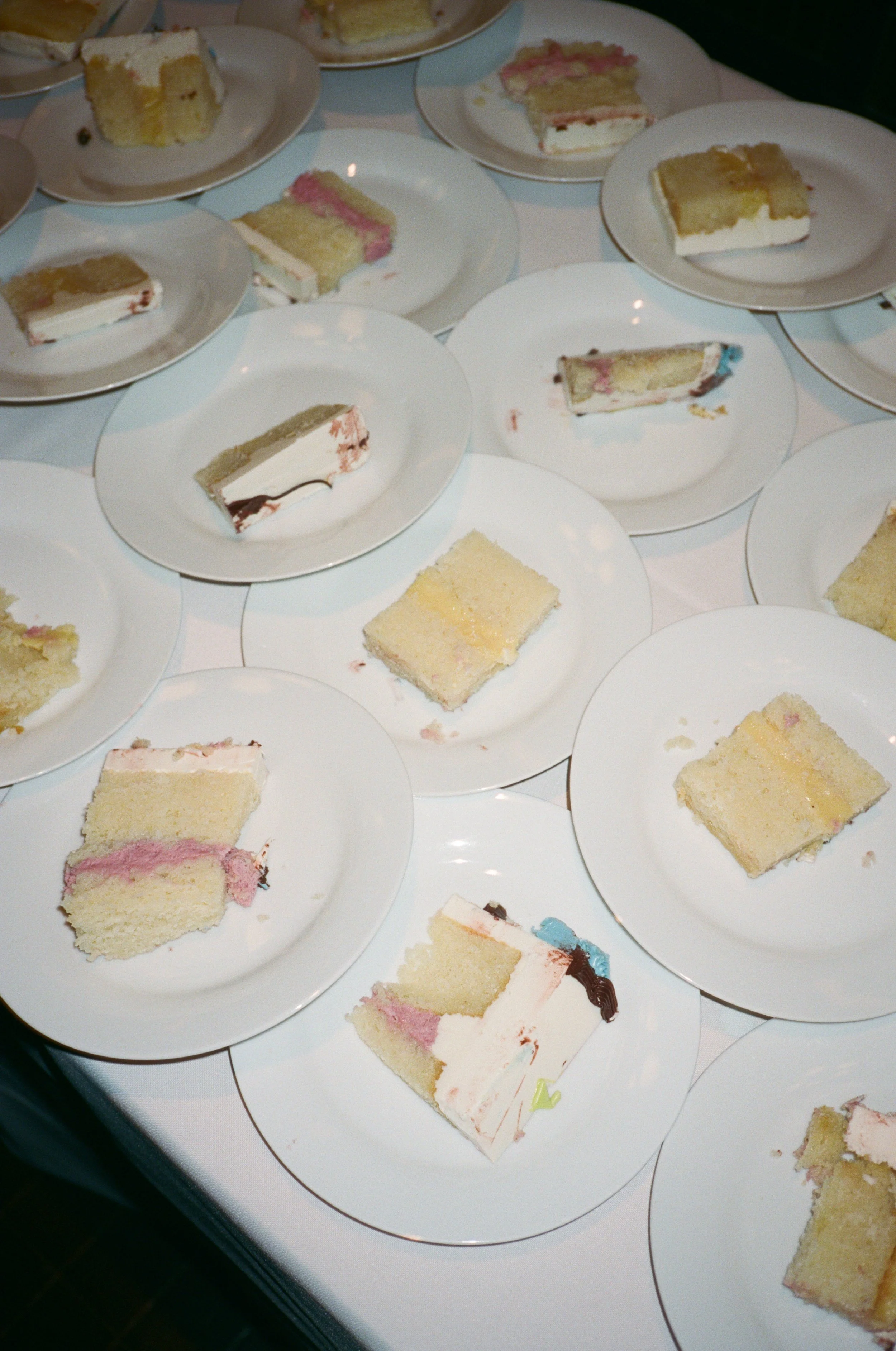 Slices of wedding cake plated and ready for dessert service