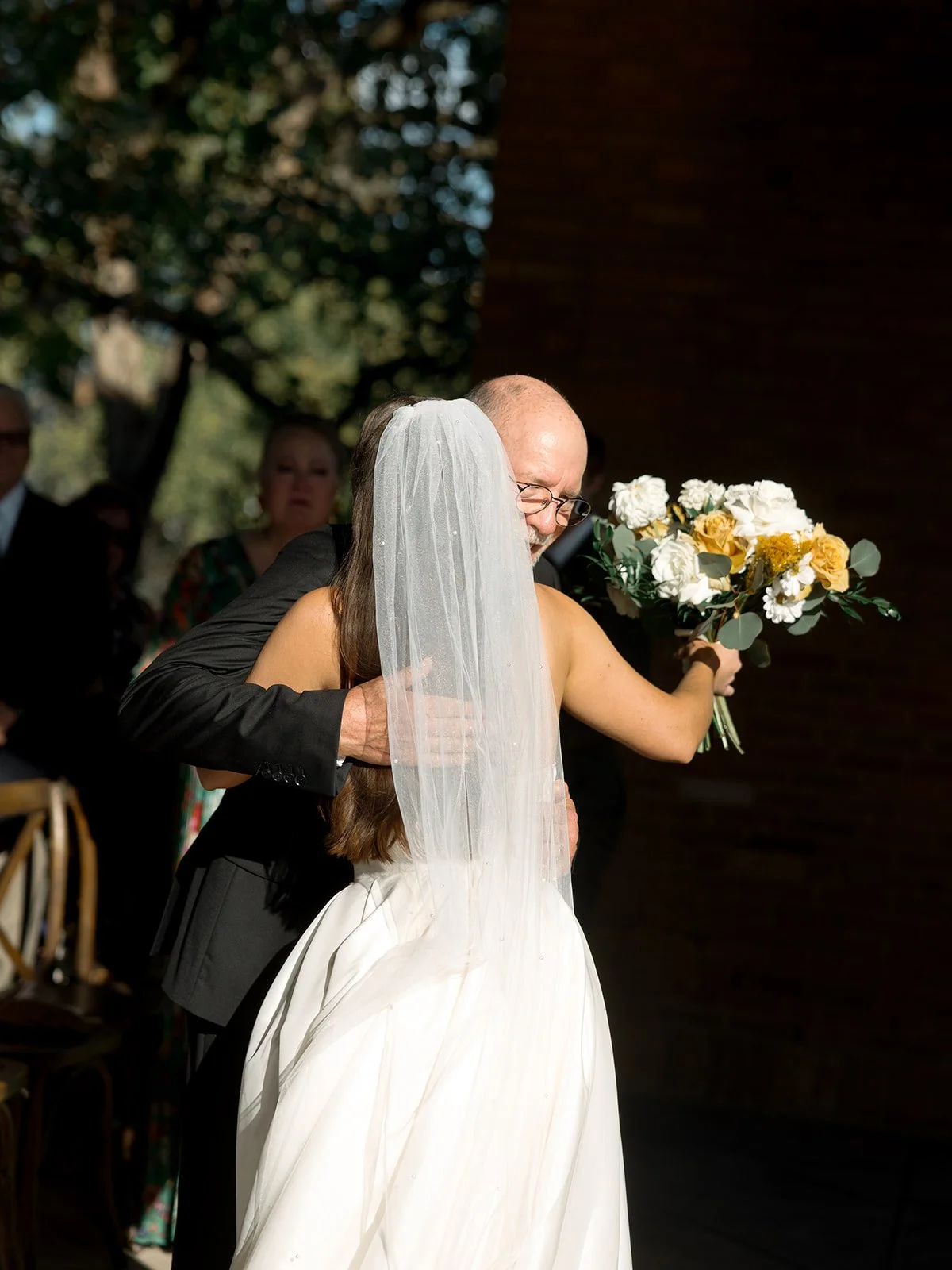 chicago-wedding-photographer-ceremony-father-daughter-emotional-embrace-03.jpg