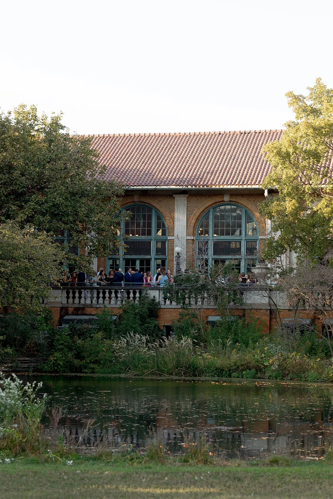 chicago-wedding-photographer-columbus-park-refectory-exterior-pond-01.jpg