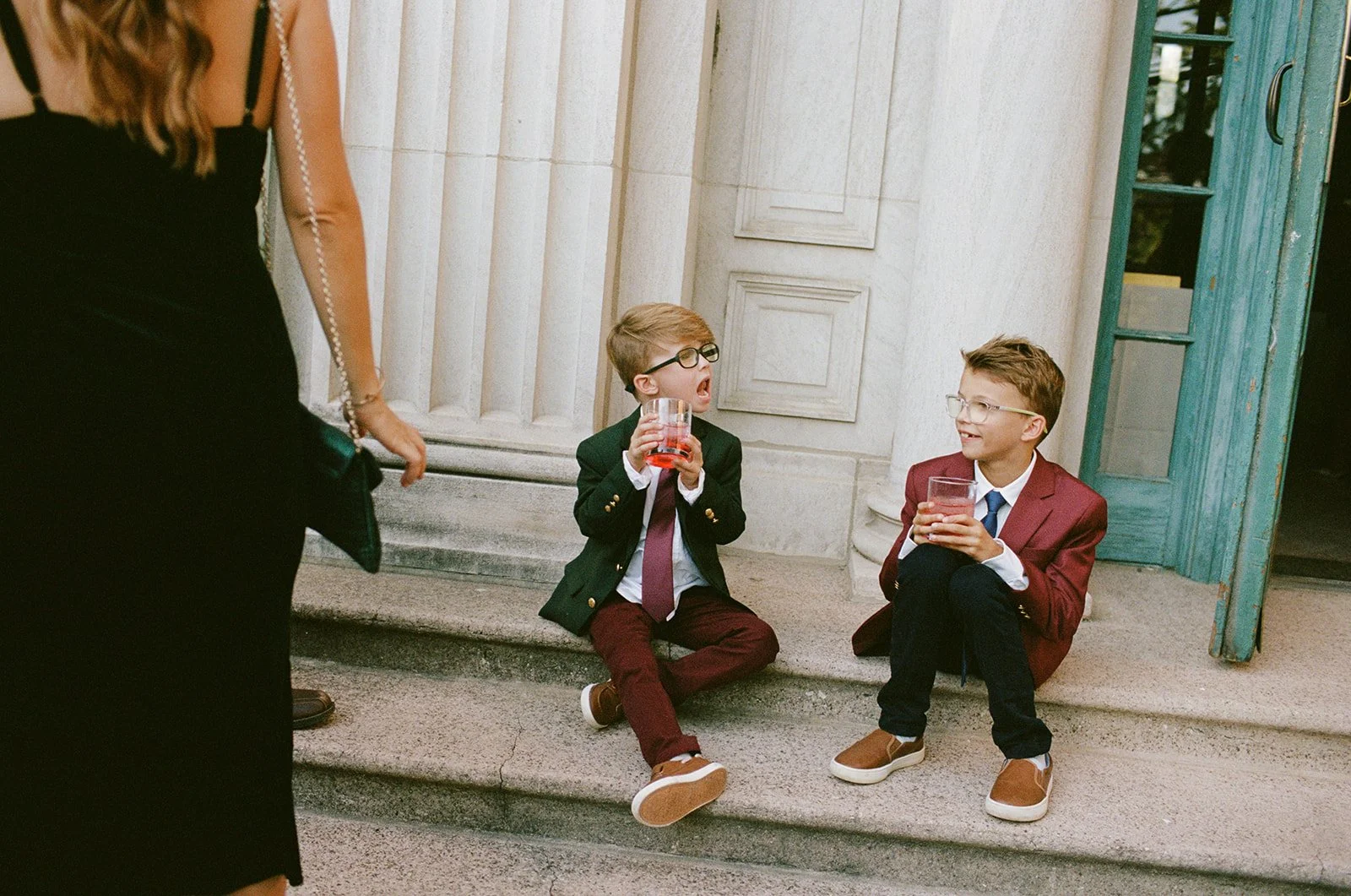 chicago-film-wedding-photographer-boys-suits-steps-cocktail-hour-35.jpg