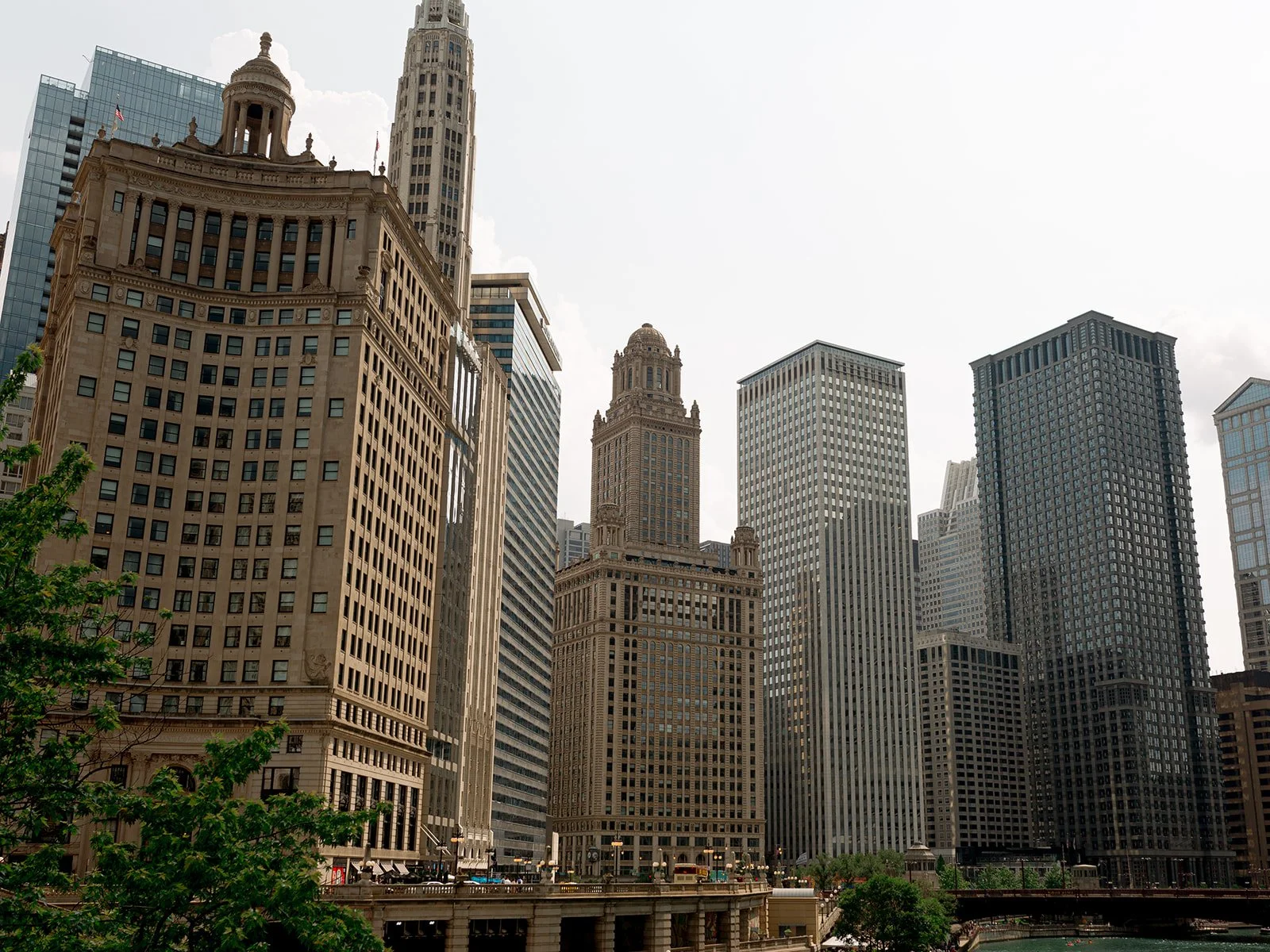 Classic view of downtown Chicago's architectural skyline — Wrigley Building and Tribune Tower framing the river.