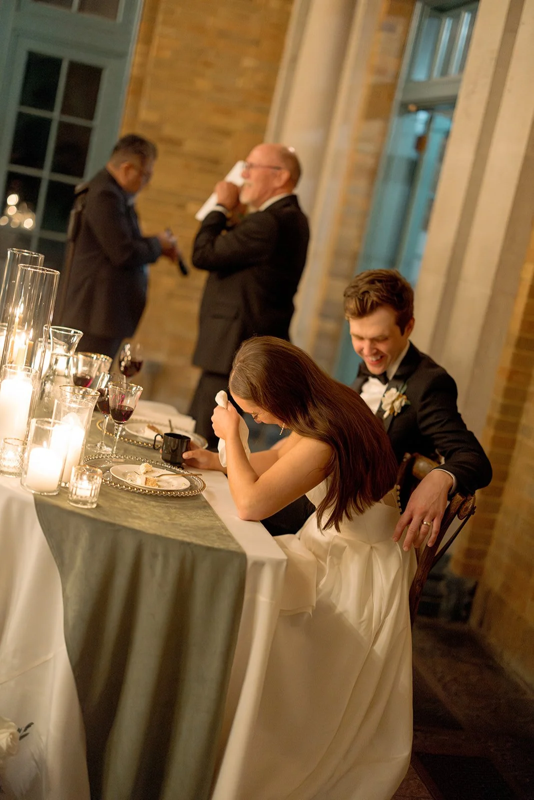 chicago-wedding-photographer-reception-sweetheart-table-intimate-candid-05.jpg