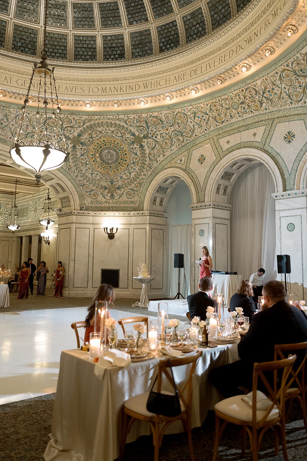 the maid of honor giving a toast at the chicago cultural center