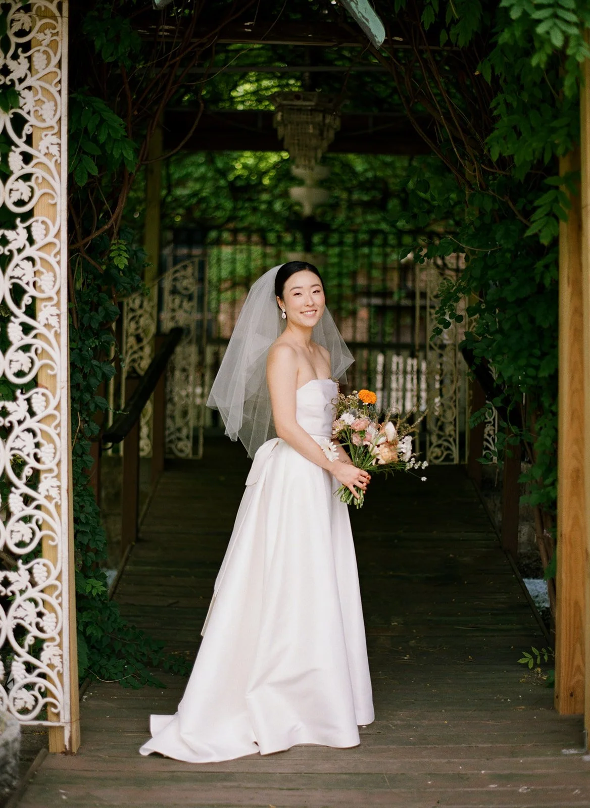 Film portrait of a bride at Salvage One in Chicago, captured by Chicago film wedding photographer Louie Abellera.