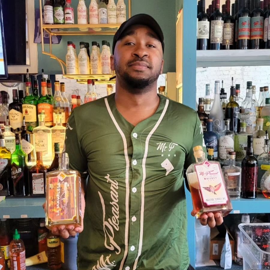 Leo looking good behind the bar at @purplepatchdc! He's rocking the old-school jersey while showing off some of the newest #MtPleasantClubWhiskey batches, including our brand new La Manplesa agave spirit!

Swing by Purple Patch in Mt Pleasant and hav