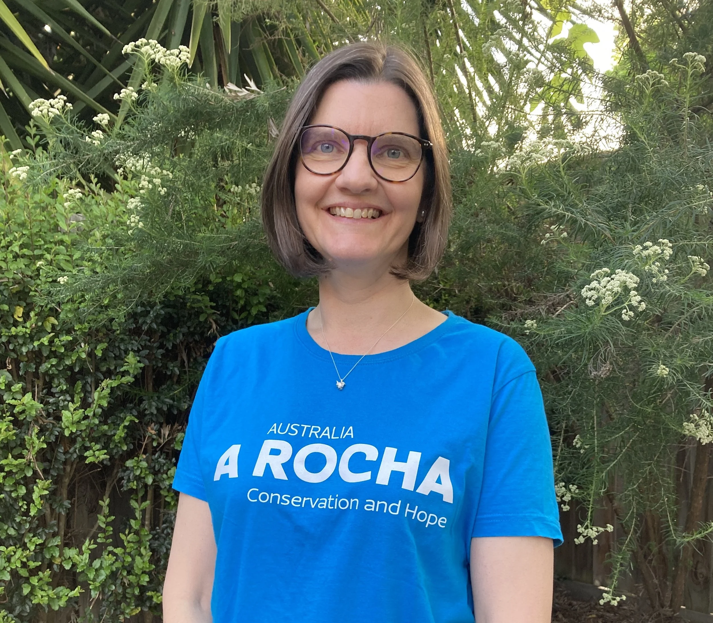 A yellow silhouette with a black question mark. 