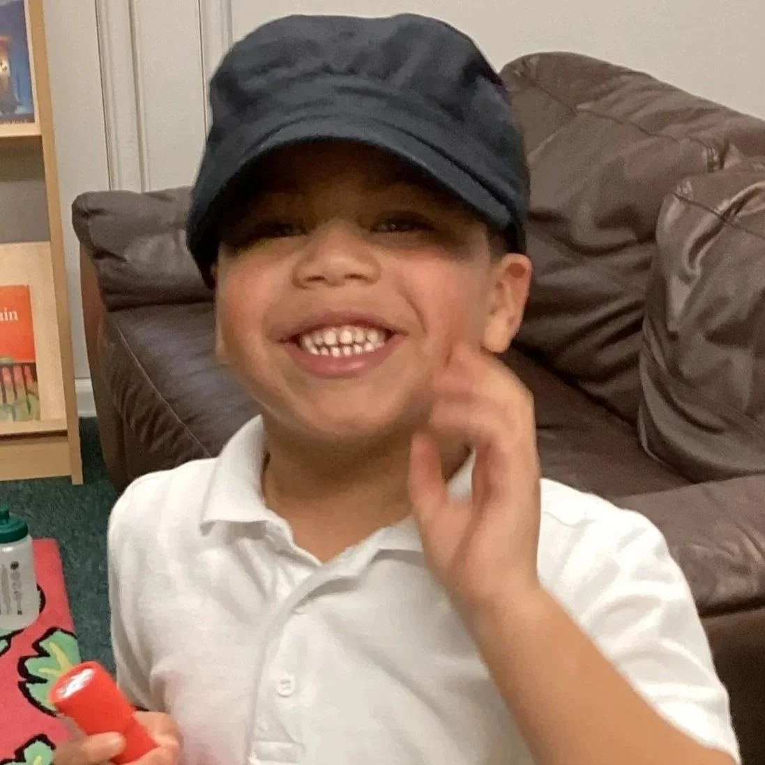 Trying on the Engineer's cap