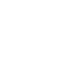 White coffee cup on a saucer with steam rising from it.
