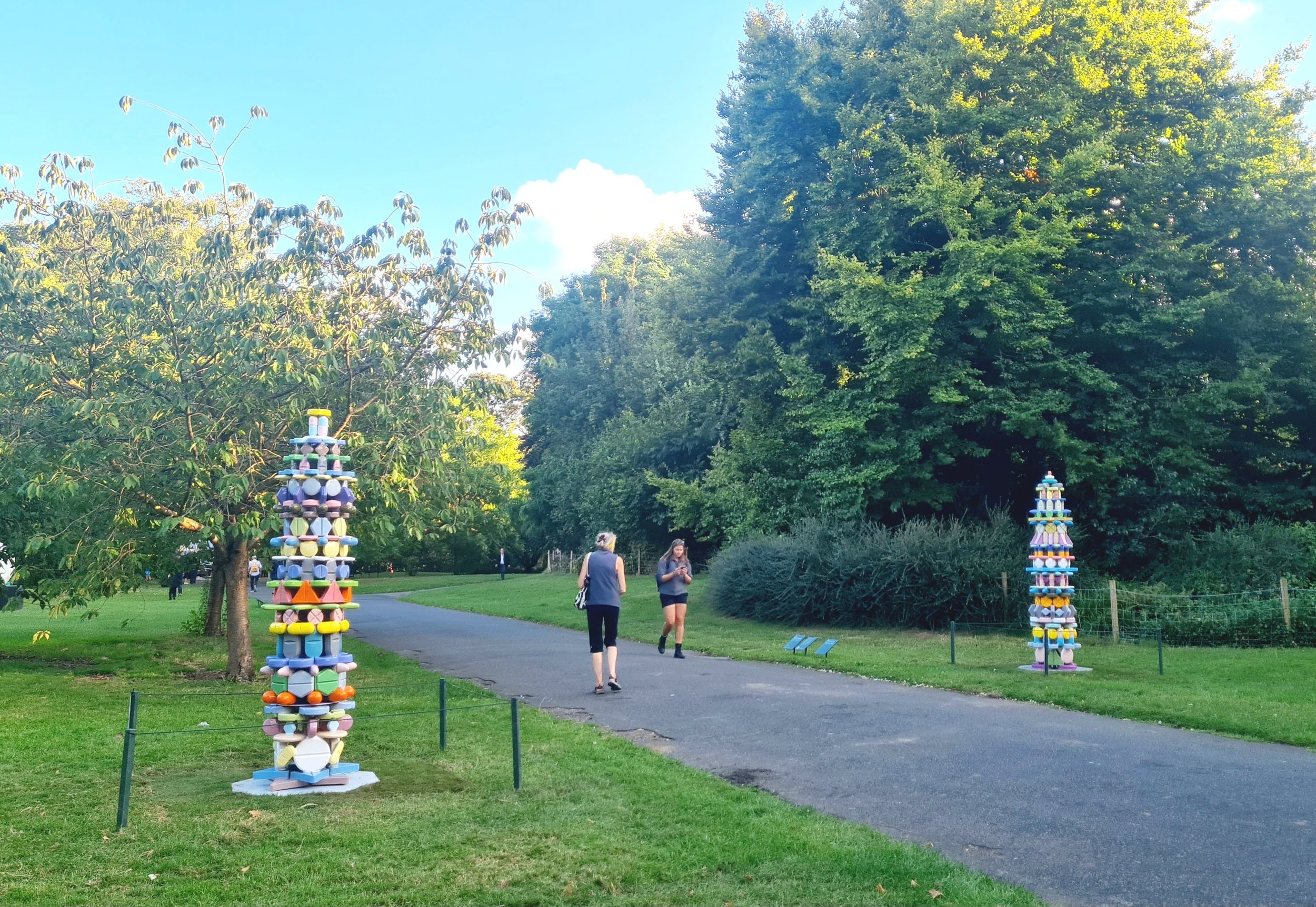 FRIEZE Sculpture in Regent's Park, installation view of "Pillar IV” and “Pillar V”, 2024. Glazed ceramics, metal structure. 